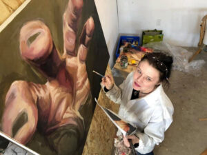 Jana F Jaros, working on her Within Reach painting